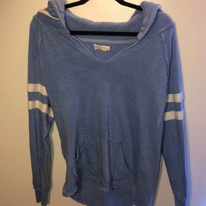 Baby blue sweatshirt, with white strips on arms